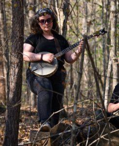 Hannah playing banjo